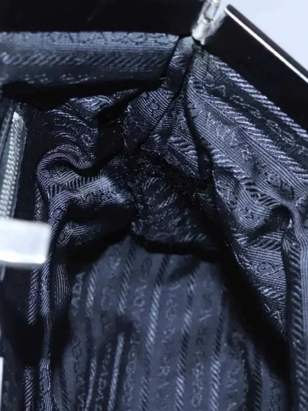 Prada brand	prada color	black